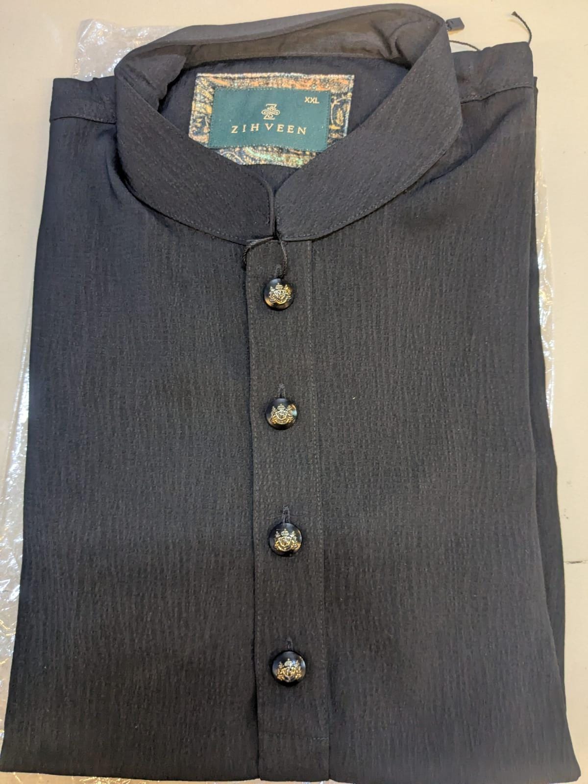 Black velvet feel solid with exclusive button
